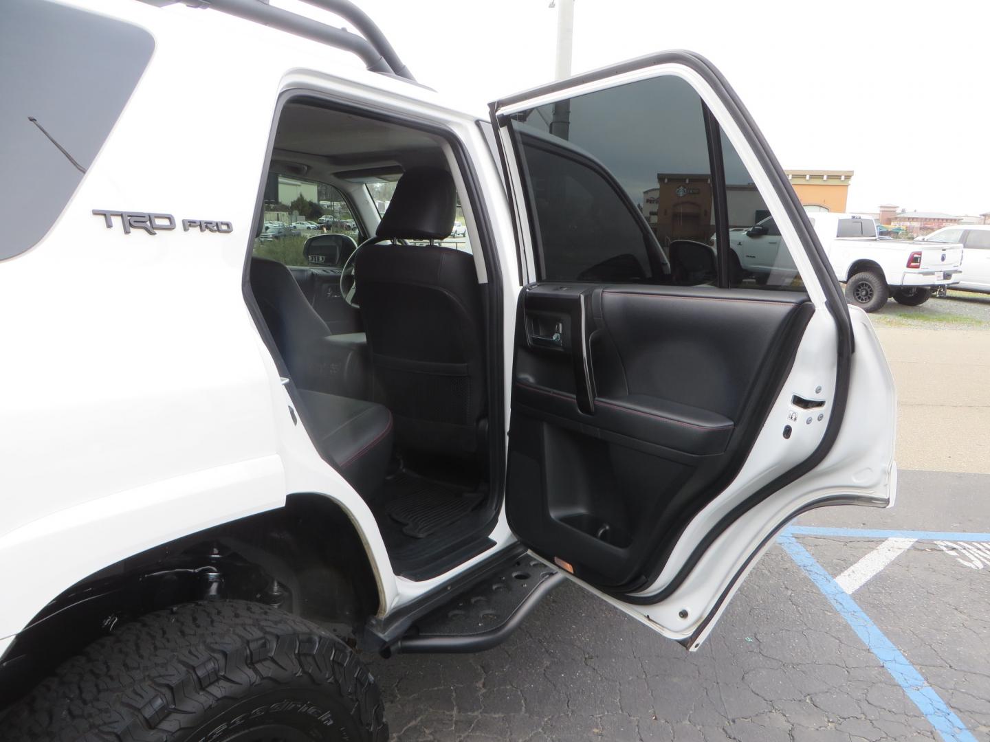 2019 White /BLACK Toyota 4Runner TRD Pro (JTEBU5JR3K5) with an 4.0L V6 engine, 5 -Speed Automatic transmission, located at 2630 Grass Valley Highway, Auburn, CA, 95603, (530) 508-5100, 38.937893, -121.095482 - Features Ironman 4X4 suspension, BFG tires, Rockslider, Roof rack, window tint, and interior Rago Fab Molle storage racks. - Photo#46